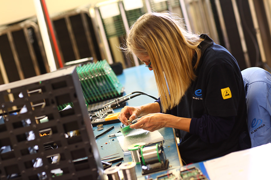PCB assembly technician at work